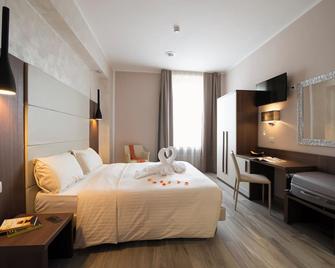 Oasi Village Hotel - Milano - Camera da letto