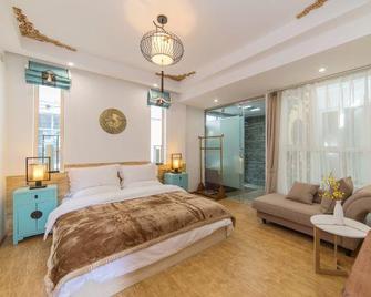 Tangdi Hotel - Dali - Bedroom