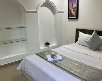 Minh Chau Hotel - Dien Bien Phu - Ho Chi Minh City - Bedroom