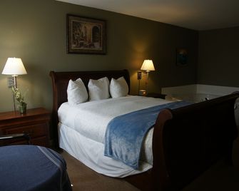 R&R Inn & Suites - Camrose - Slaapkamer