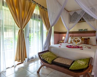 Ubud Aura Wellness Sanctuary - Ubud - Bedroom