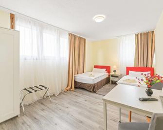 Businesshotel Lemon Suites Self Check-in Messe Airport - Neuhausen auf den Fildern - Schlafzimmer