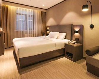 Hanting Hotel Cangzhou Jiefang Road - Cangzhou - Bedroom