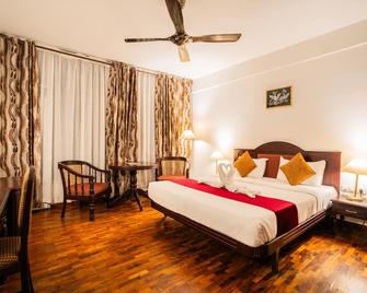 Hotel C7 Munnar - Munnar - Bedroom