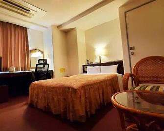 Nobeoka Urban Hotel - Nobeoka - Bedroom