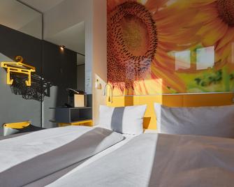 فندق بادي - ميونخ - غرفة نوم