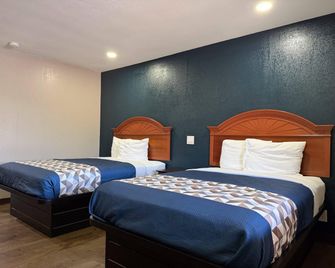 Rodeway Inn & Suites - Ada - Schlafzimmer