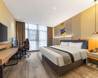 Gem Hotel Nantong Railway Station Wanxiang Cheng - Nantong - Bedroom