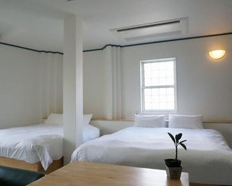 Awajishima Hotel Lodge Green Cozy - Minamiawaji - Camera da letto