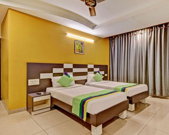 Treebo Raj Elegance Manyata Tech Park - Bengaluru - Bedroom