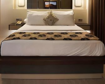 Hotel Palmy - Tanjung Redeb - Habitación