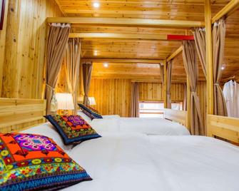 Fengming Shanju Hongcun Sleepless Homestay - Huangshan - Sypialnia