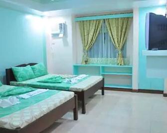 Apartelle de Francesca - Puerto Galera - Habitación