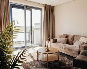 Comfortable 2-guest De Vlijt First Class Suite - De Cocksdorp - Sala de estar