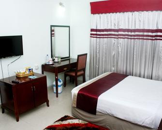 Meridian Hotel - Chittagong - Schlafzimmer