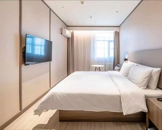 Hanting Hotel Yulin Dongsha Yingsha Road - Yulin - Habitación