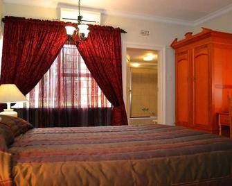 Midway Inn - Middelburg - Camera da letto