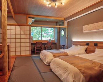 Hotel Adventure Towadako Okuse - Towada - Ložnice