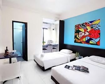 Legreen Suite Ratulangi - Ambon - Bedroom