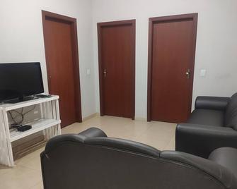 Aquares Residence - Apartamento Central Capitólio - Capitólio - Salon