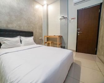 Umbrella Hotel Syariah by My Hospitality - Pamulang - Bedroom
