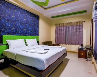 Hotelsarkarpalace - Ooty - Schlafzimmer