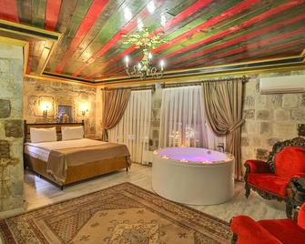 Bedrock Cave Hotel - Göreme - Schlafzimmer