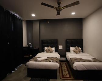 Hotel Visit - Barnāla - Habitación