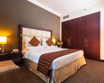 Flora Park Deluxe Hotel Apartments - Dubai - Bedroom