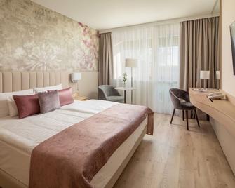 Hotel Carbona Thermal Spa - הביץ - חדר שינה