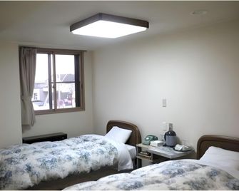 Date Business Hotel Castle - Noboribetsu - Makuuhuone