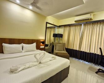 Hotel Landmark - Ratnagiri - Slaapkamer