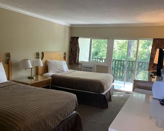 Okanagan Royal Park Inn by Elevate Rooms - Vernon - Bedroom