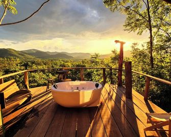 Ecopousada Toca do Guará - אלטו פאראיסו דה גויאס - מרפסת