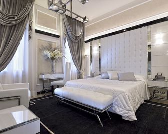 هوتل بالازيتو مادونا - البندقية - غرفة نوم