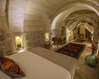 Doda Artisanal Cave Hotel - Adults Only - - Urgup - Спальня
