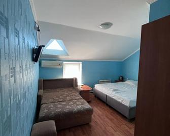 Hotel na Nezhdanovoy 13 - Volgograd - Bedroom