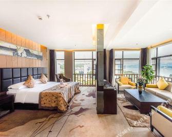 Hongqiao International Hotel (Yichang Yanjiang Avenue Natural Tower) - Yichang - Slaapkamer