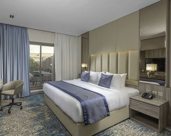 Seven Gardens Hotel - Ер-Ріяд - Спальня
