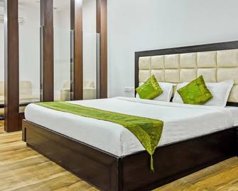 Treebo Red Petal Jalandhar - Jalandhar - Bedroom