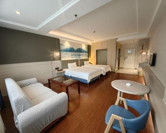 Wing Tin Hotel (Shenzhen Longgang Nanlian) - Shenzhen - Habitación