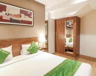 Treebo Elite Residency - 2 kms from Railway station - Belgaum - Schlafzimmer