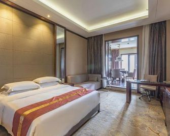 Huaxin Hotel - Xianning - Bedroom