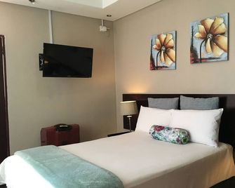 Yana Bed & Breakfast - Gaborone - Quarto