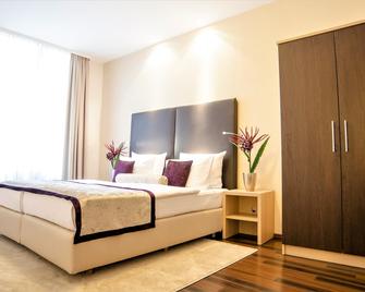 فندق ميركور - سوبيريور - بادين-بادين - غرفة نوم