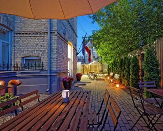 Rigaapartmentcom Sonada Hotel - Riga - Patio