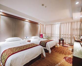 Peony Plaza - Luoyang - Habitación