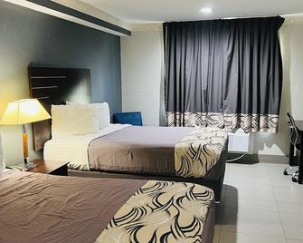 Regency Inn & Suits - יוסטון - חדר שינה