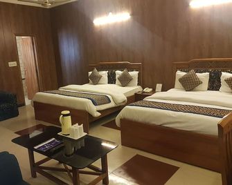 Hotel Doon Regency Dehradun - דהרדון - חדר שינה