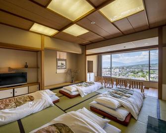 Onsen Hotel Omoto - Matsumoto - Slaapkamer